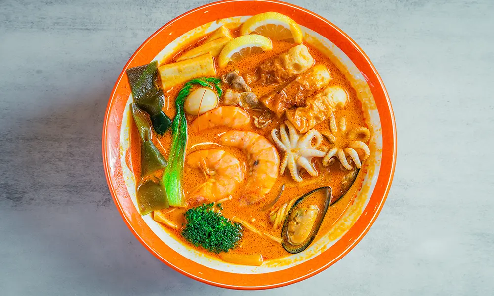 Malatang with mixed seafood, veggies, and lemon in Tom Yum broth at YGF Malatang-Katy, a Chinese Restaurant in Katy