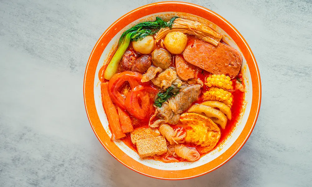 Malatang with mixed ingredients in sweet & sour tomato broth at YGF Malatang-Katy, a Chinese Restaurant in Katy